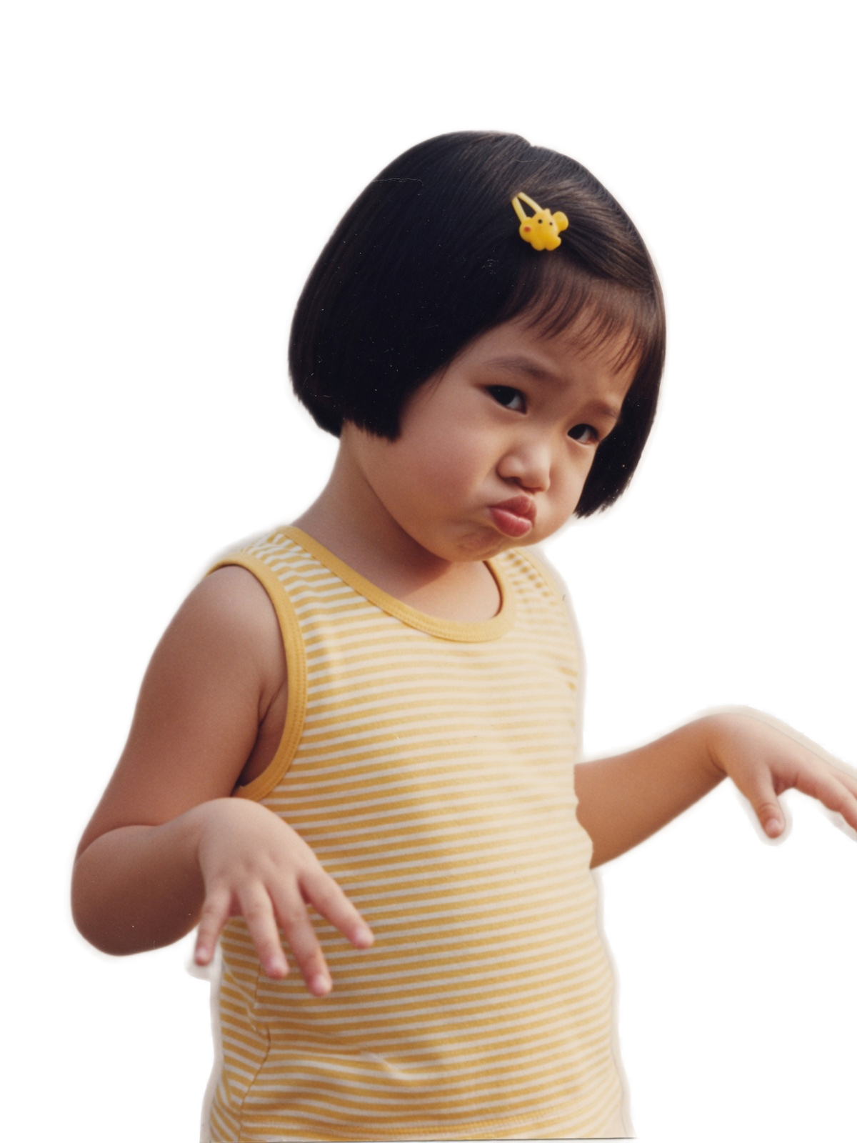 A little girl giving an adorably unimpressed look